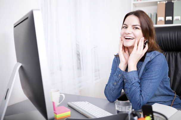 Office Woman Leaning on Table with Hands on Face - Photo, Image