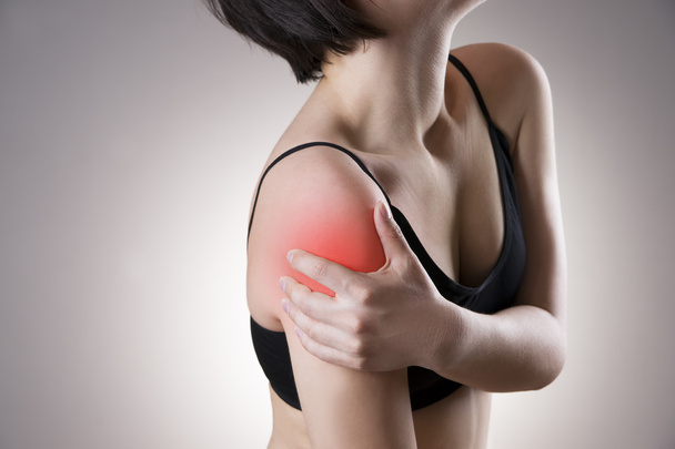 Pain in the women's shoulder - Zdjęcie, obraz