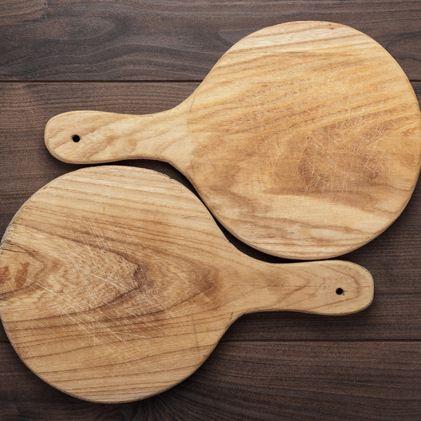 two handmade breadboards on table - Φωτογραφία, εικόνα