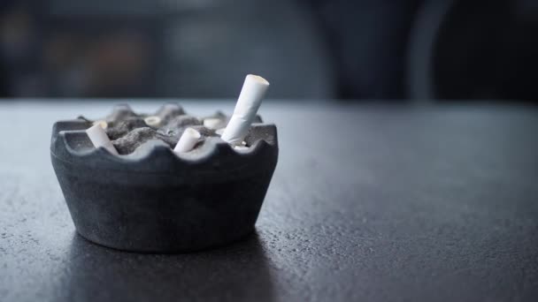 Close up burning cigarette in ashtray , - Footage, Video