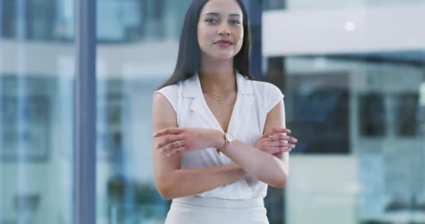 Businesswoman, arms crossed and smile with face, office and professional, accountant and happiness. Confident, young and workplace for career, finance clerk and woman for startup, job and elegant. - Footage, Video