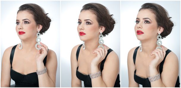 Hairstyle and make up - beautiful female art portrait with earrings. Elegance. Genuine natural brunette with jewelries in studio. Portrait of a attractive woman with red lips and creative makeup - Photo, Image