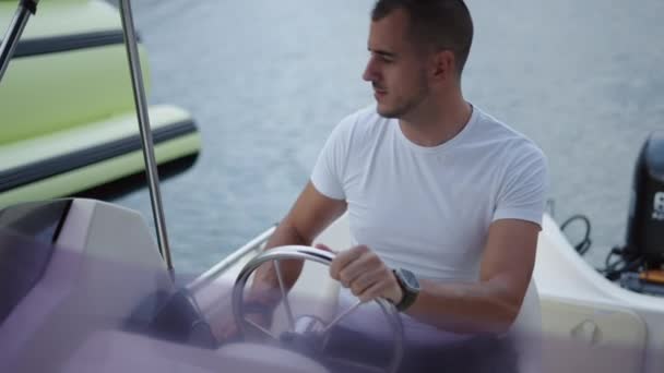 Spanish man reversing his boat in Valencia - Luxury lifestyle - Footage, Video