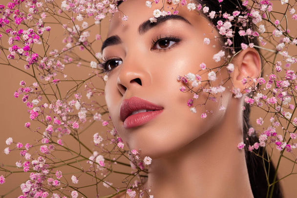 Close up photo of gentle lady aesthetic pure perfect skin facial floral mask cream isolated on beige color background. - Photo, Image