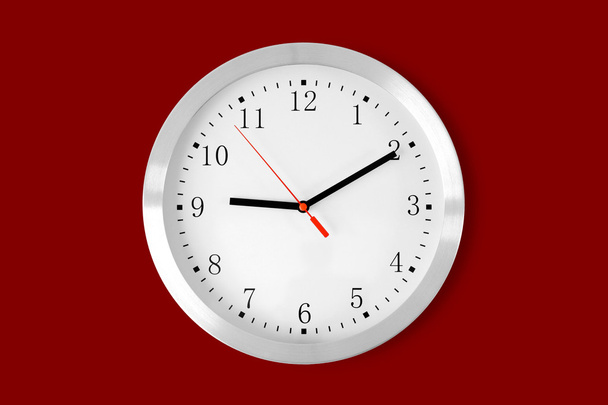 classic clock on red background - Photo, Image