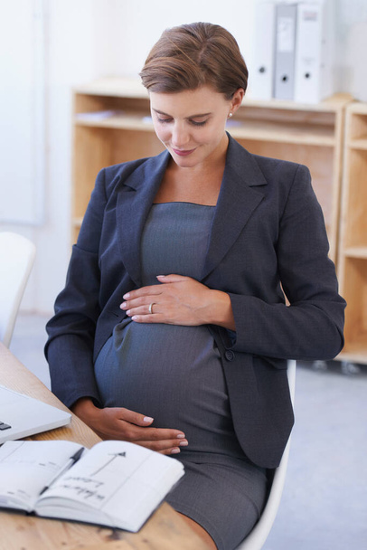 Woman, pregnant and maternity thinking or book for work break, childcare or waiting motherhood date. Female person, stomach and hands as professional employee or corporate career, note for infant. - Photo, Image