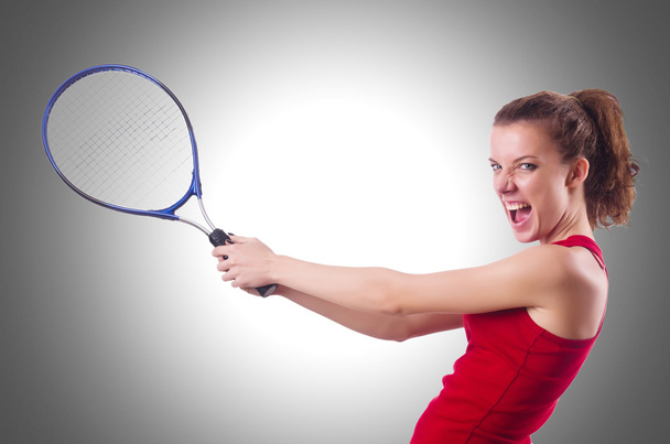 Nainen pelaa tennistä
 - Valokuva, kuva