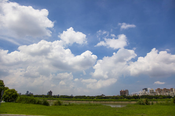 The hot summer blue sky and white clouds are clear and thorough - Photo, Image