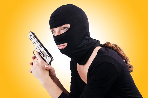 Criminal woman with gun - Photo, Image