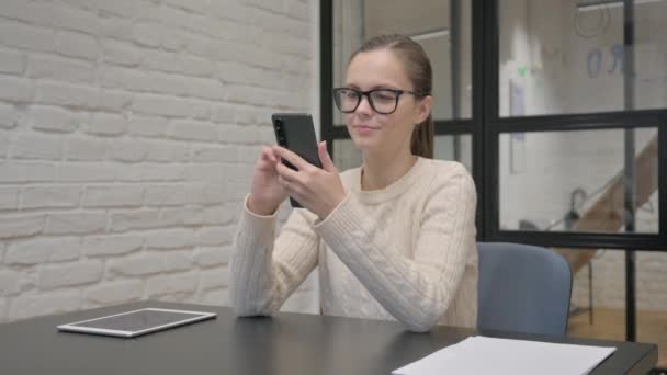 Creative Woman Using Phone at Work - Footage, Video