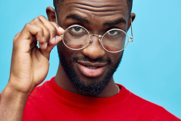 clothing man black accessory african person american background glasses stylish copy style coiffure space blue portrait fashion model elegant beauty smile fashionable indoor - Photo, Image