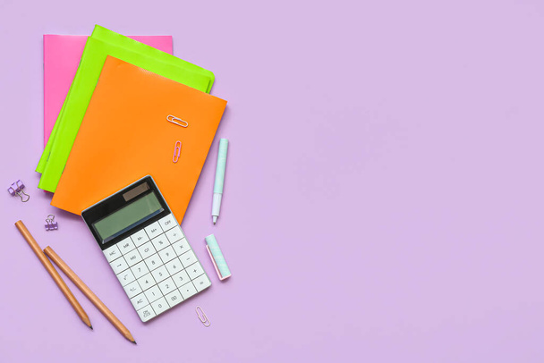 Composition with school supplies on lilac background - Photo, Image