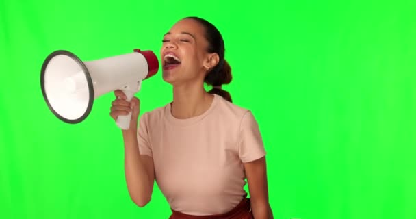 Megaphone, green screen and happy woman for broadcast, sale or news, discount or announcement. Excited person or speaker speaking, voice and speech for retail or promotion deal on a studio background. - Footage, Video