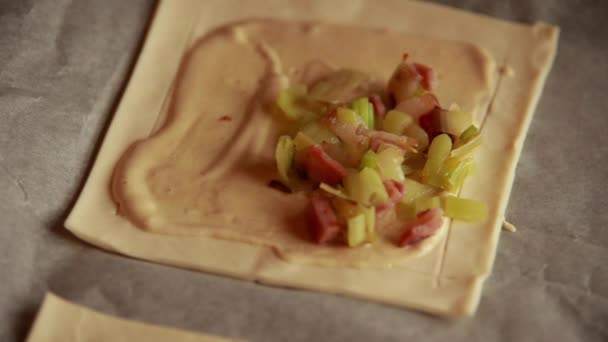 Close-Up Preparing Delight: Tart with Puff Pastry, Leek, Bacon, and Goat Cheese - Culinary Craft - Filmagem, Vídeo