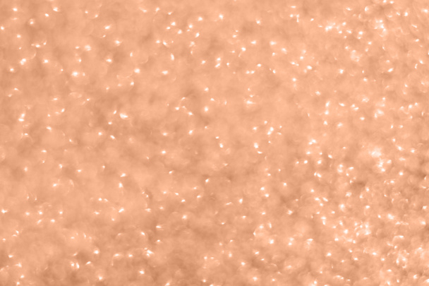 Золотой сверкающий фон с блестящим размытым боке - Фото, изображение