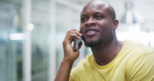 Businessman, phone call and talking in office for networking conversation, company planning or online communication. Black man, mobile device and smile for career opportunity, discussion for future. - Footage, Video