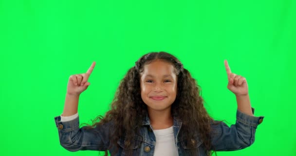 Green screen, face and happy kid pointing up in studio for promotion, announcement or deal. Portrait, smile and finger sign for information, choice or decision, notification or news, alert or sale. - Footage, Video