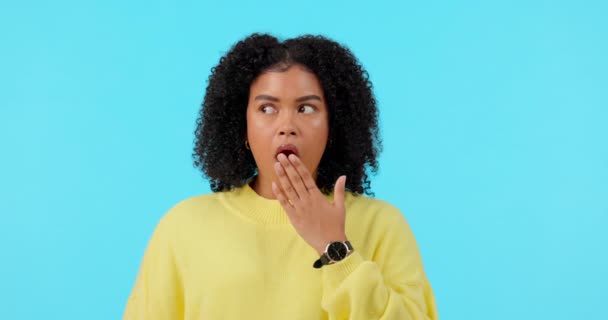 Wow, surprise and face of a woman on a green screen isolated on a blue background in a studio. Mistake, shocked and portrait of a young girl with shock facial expression from gossip or a rumor. - Footage, Video