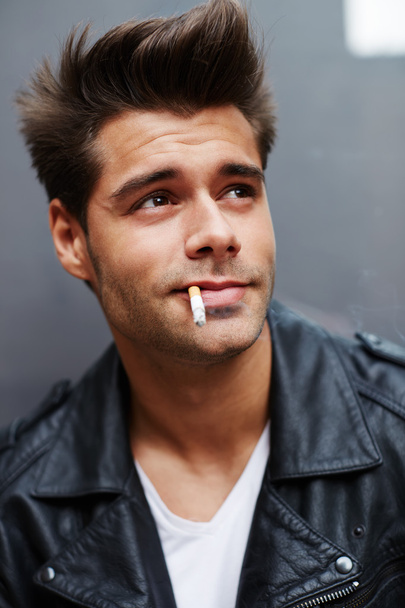 Man with cigarette in his mouth - Foto, Bild