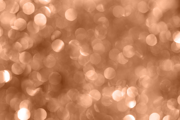 Zlaté jiskřící pozadí s lesklým rozmazaným zadkem - Fotografie, Obrázek