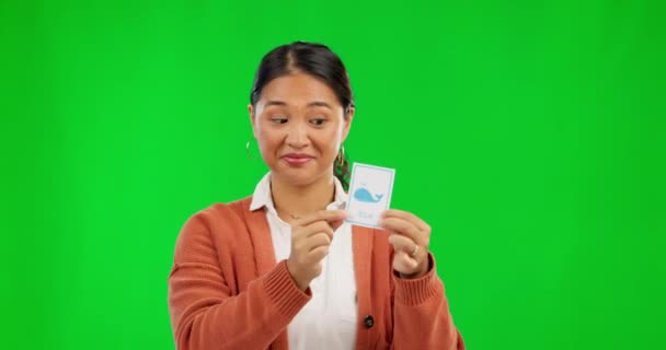Portrait, woman and school teacher on green screen with lesson on card for language learning in Japan. Teaching, elearning and Asian educator for homeschool, online class and information in education. - Footage, Video