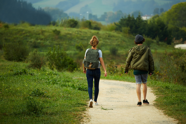 Couple hiking on a mountain trail - Fotografie, Obrázek