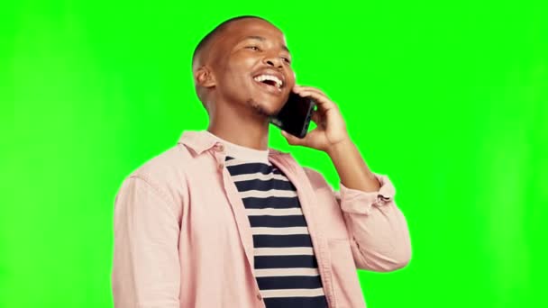 Black man, phone call and green screen with communication, talking and smartphone with mockup space. Male person, happy with chat and tech, connection with discussion isolated on studio background. - Footage, Video