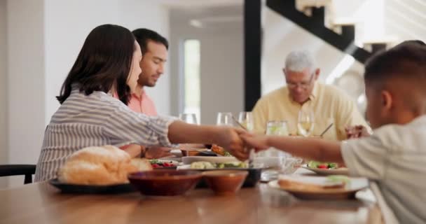 Family, holding hands and praying at dinner, table and gratitude for food, God and together in home. Grandfather, parents and kids with prayer at meal for spiritual, worship or respect from religion. - Séquence, vidéo