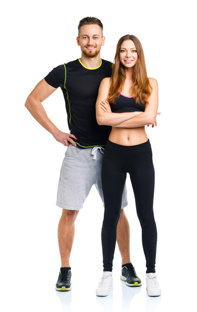 Αθλητισμός ζευγάρι - άνδρας και γυναίκα, μετά την άσκηση γυμναστήριο στο λευκό - Φωτογραφία, εικόνα