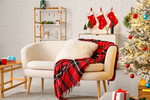 Interior of stylish living room with beautiful Christmas tree - Photo, Image