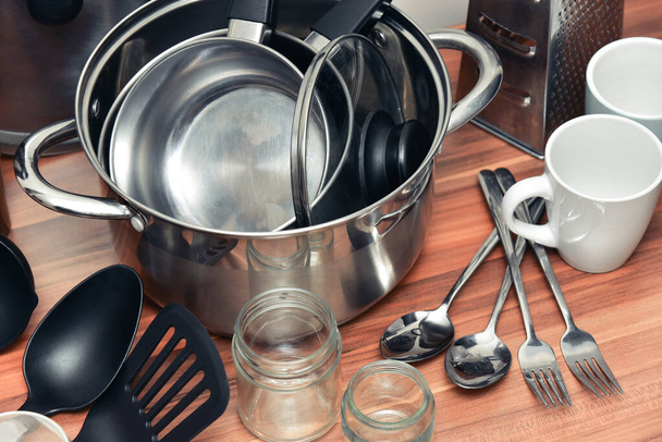 Metal kitchenware for cooking diner, close up view. Collection of kitchen utensil. - Photo, Image
