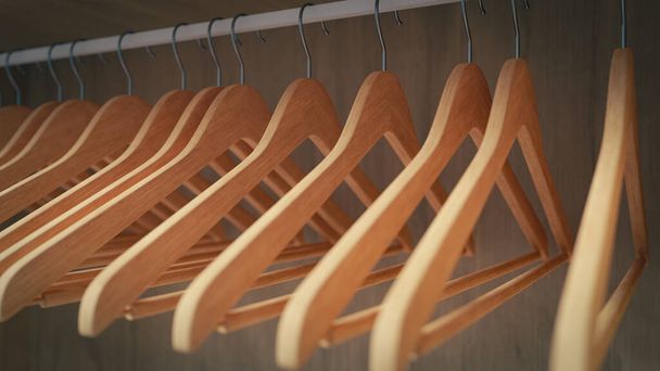 mehrere leere Kleiderbügel im leeren Kleiderschrank für die Organisation des Kleiderschranks, 3D-Rendering - Foto, Bild
