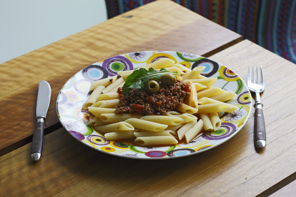 Pasta with meat stuffing and olives - Zdjęcie, obraz