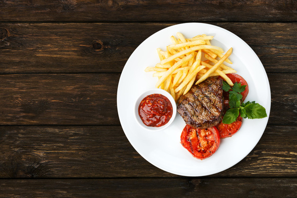 Restaurant food - beef grilled steak with french fries - Photo, Image