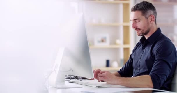 Business man, computer and office typing of a web designer working on a tech project. Company employee, email and planning on the internet with online research in startup workplace with technology. - Footage, Video