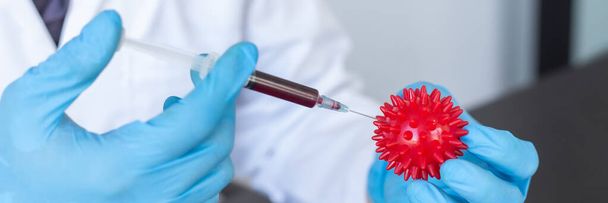 科学者や医師は、研究室で分析とワクチン接種のためのウイルス患者の新しい株から血液サンプルを収集します,ウイルスの概念を排除するためのワクチン研究. - 写真・画像