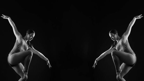 Kaunis pullea ruskeahiuksinen nainen mustassa puvussa studiossa. Valkoihoinen tanssija poseeraa - Valokuva, kuva