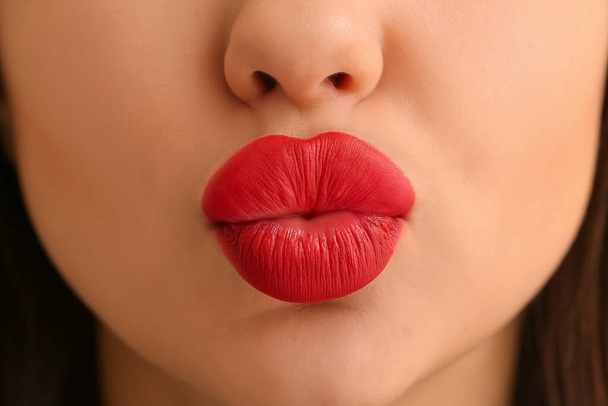 Beautiful woman with bright red lipstick, closeup - Photo, Image