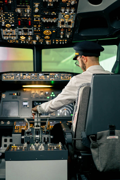 Airplane pilot controls throttle during flight or takeoff Cockpit view air traffic control - Photo, Image