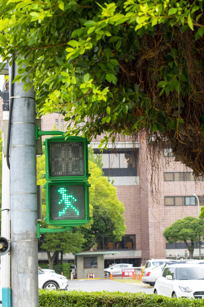 Sinal de pedestre único luz pouco homem verde semáforo em Taipei, Taiwan - Foto, Imagem