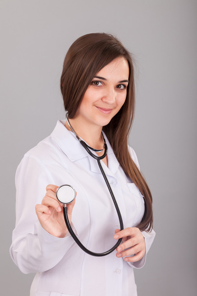 Nurse Holding Stethoscope - Фото, изображение