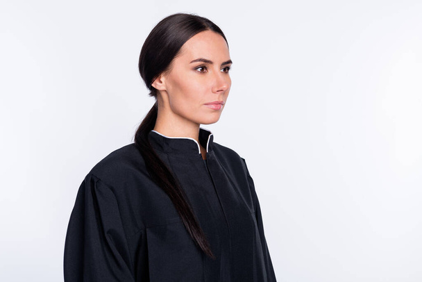 Profiel side photo of serious woman attorney judge look copyspace wear black robe coat isolated on white color background. - Φωτογραφία, εικόνα