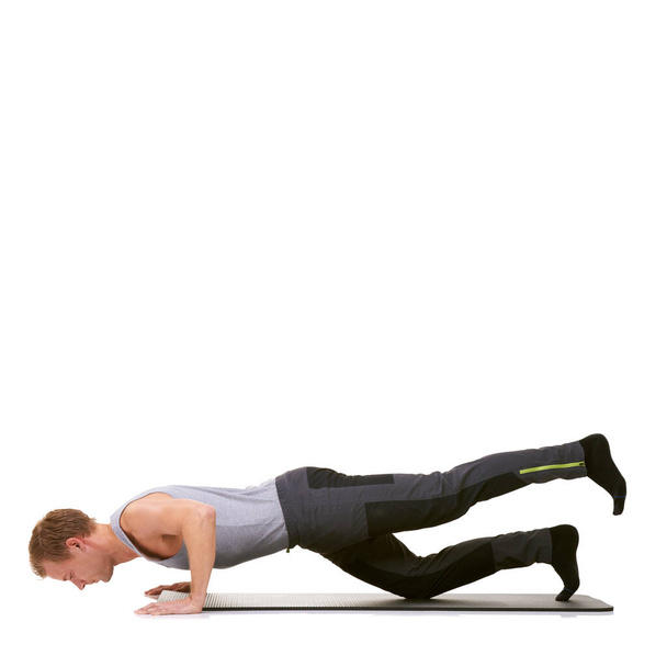 Man, pilates and mat in studio for push ups, fitness or workout for healthy body, wellness or core muscle. Person, exercise or yoga on floor for abdomen health on mockup space or white background. - Photo, Image