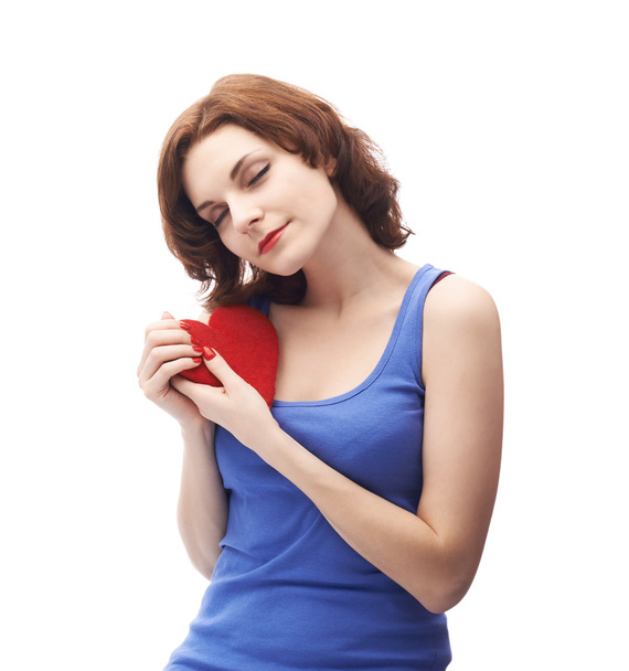 Woman holding  red heart - Foto, afbeelding