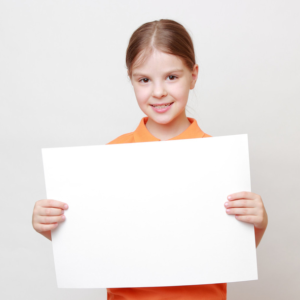Kid holding white blank - Foto, Imagem