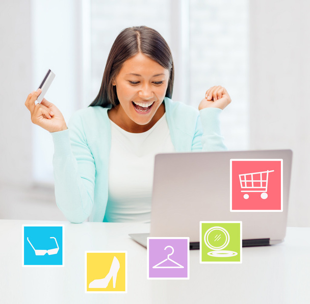 happy businesswoman with laptop and credit card - Fotó, kép