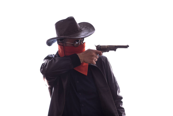 ковбойський бандит поза законом з закритим обличчям і капелюхом - Фото, зображення