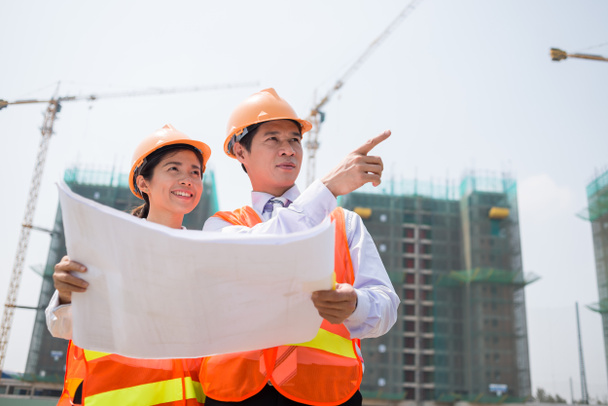 Supervisors inspecting construction site - Photo, Image