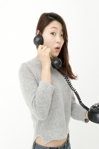 Asian woman talking by telephone - Photo, image