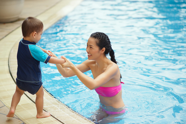 Chinese family in the pool - Photo, Image
